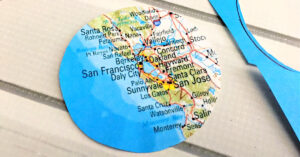 Circle shaped piece of map cut out.