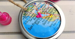 Pink puffy paint heart painted over San Francisco on map piece.