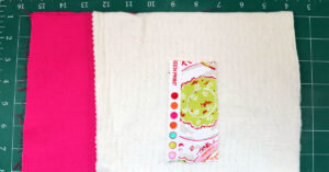 Cut the pieces of fabric to the appropriate size for the pot holder